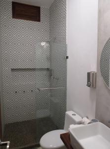 Ett badrum på Casa Cora