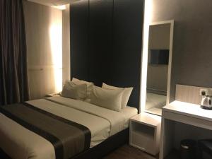 Postel nebo postele na pokoji v ubytování Hotel Austin Paradise - Taman Pulai Utama