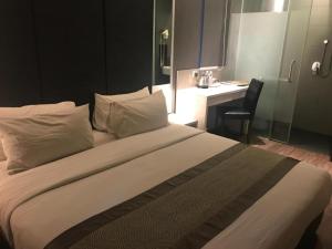 Postel nebo postele na pokoji v ubytování Hotel Austin Paradise - Taman Pulai Utama