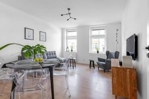 Televízia a/alebo spoločenská miestnosť v ubytovaní Parkowa 33 Apartment Sopot