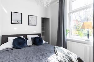 Posteľ alebo postele v izbe v ubytovaní Parkowa 33 Apartment Sopot