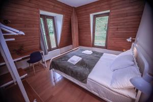 Кровать или кровати в номере Latour Mestia