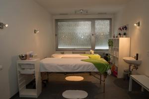 Postel nebo postele na pokoji v ubytování Hotel AM Fang