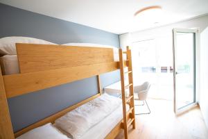 Katil dua tingkat atau katil-katil dua tingkat dalam bilik di Residenz Hofer