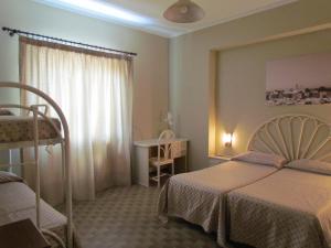 Postel nebo postele na pokoji v ubytování Pietra Pomice Hotel + 37 fotografií