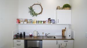 a small kitchen with a counter and a sink at La Dolce Vita in Beechmont