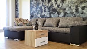 Posezení v ubytování Vila Věkoše - apartmán s terasou a zahradou
