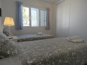 Posteľ alebo postele v izbe v ubytovaní Casa Sur