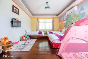 Postel nebo postele na pokoji v ubytování Shan Tyi Homestay