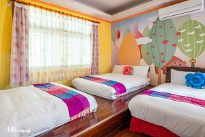 Postel nebo postele na pokoji v ubytování Shan Tyi Homestay