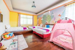 Postel nebo postele na pokoji v ubytování Shan Tyi Homestay