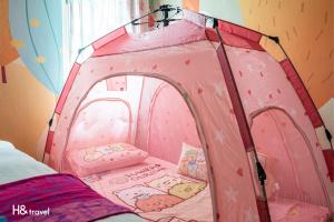Postel nebo postele na pokoji v ubytování Shan Tyi Homestay