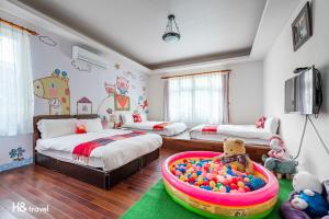 Postel nebo postele na pokoji v ubytování Shan Tyi Homestay