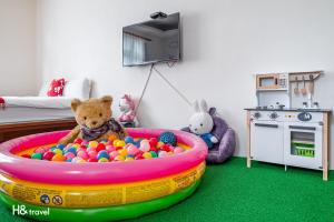 TV a/nebo společenská místnost v ubytování Shan Tyi Homestay
