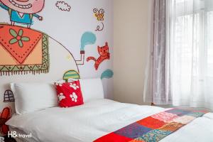 Postel nebo postele na pokoji v ubytování Shan Tyi Homestay