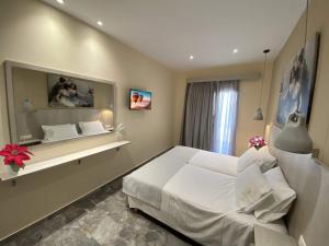 Cama ou camas em um quarto em MIKE'S STUDIOS