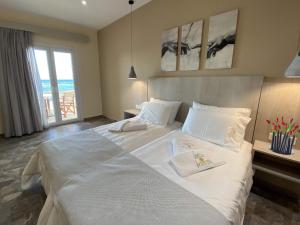 Cama ou camas em um quarto em MIKE'S STUDIOS