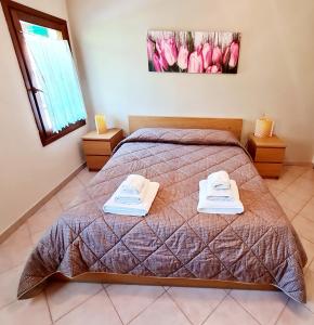 Posteľ alebo postele v izbe v ubytovaní Casa Colonna Montegrotto terme