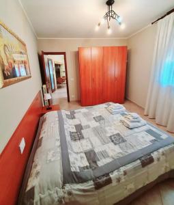 Posteľ alebo postele v izbe v ubytovaní Casa Colonna Montegrotto terme