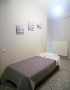 Posteľ alebo postele v izbe v ubytovaní Sandra's Studios