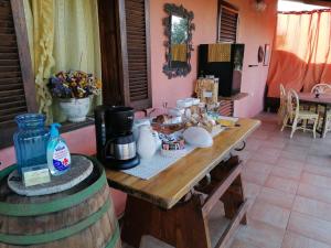 TV a/nebo společenská místnost v ubytování Il Vigneto B&B