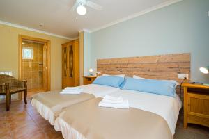 Postel nebo postele na pokoji v ubytování Finca Bilou + 36 fotografií