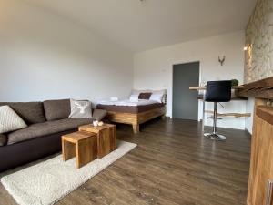 Χώρος καθιστικού στο Alpine Studio Apartment by AA Holiday Homes