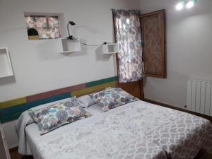 Voodi või voodid majutusasutuse CASITA RUSTICA DE INVITADOS (NEXT TO XATIVA) toas