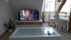 TV a/nebo společenská místnost v ubytování Eulen- & Altstadtnest