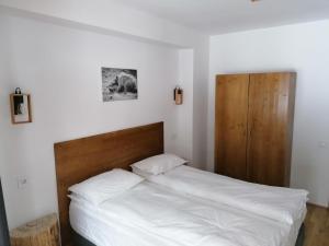 Postel nebo postele na pokoji v ubytování Vila Cedra