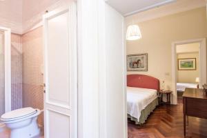 Postel nebo postele na pokoji v ubytování Vatican Large Comfortable Apartment
