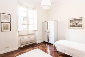 Postel nebo postele na pokoji v ubytování Vatican Large Comfortable Apartment