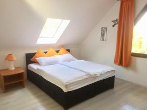 Posteľ alebo postele v izbe v ubytovaní Flair Apartmanház