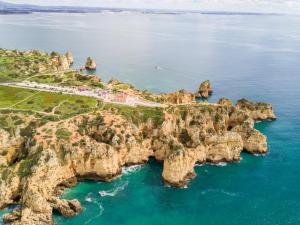 an aerial view of a rocky island in the ocean at Studio Marina View by Seewest in Lagos