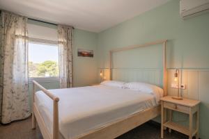 Postel nebo postele na pokoji v ubytování Villa Sabina