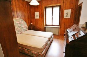 Postel nebo postele na pokoji v ubytování Casa Iolanda
