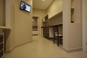 TV a/nebo společenská místnost v ubytování Hotel Emacite Flex