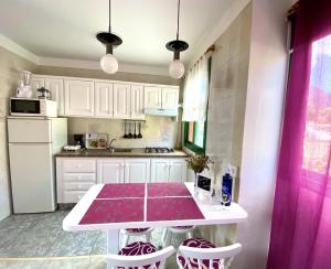 Kuchyňa alebo kuchynka v ubytovaní Home2Book Relax Apartment Buenavista
