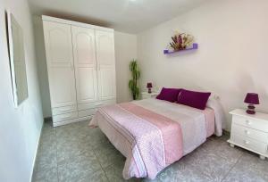 Posteľ alebo postele v izbe v ubytovaní Home2Book Relax Apartment Buenavista