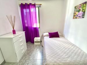 Posteľ alebo postele v izbe v ubytovaní Home2Book Relax Apartment Buenavista