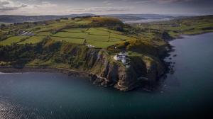 an aerial view of an island in the water at Temple-Effin Self Catering Holiday Cottage in Whitehead