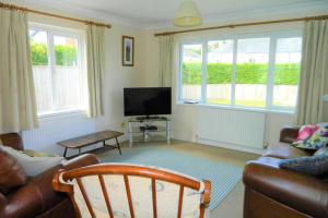 Et tv og/eller underholdning på Stockwood Holiday Bungalow