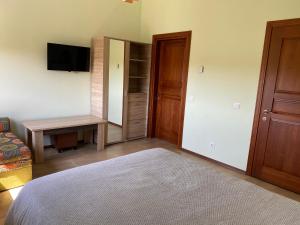 Postel nebo postele na pokoji v ubytování Guest House Atostogana