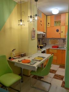 Kuchyň nebo kuchyňský kout v ubytování Apartment Adela