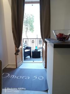 Posedenie v ubytovaní Dimora50 Apartament