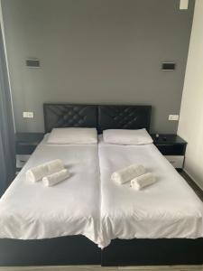 Letto o letti in una camera di Hotel Niko