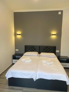 Letto o letti in una camera di Hotel Niko