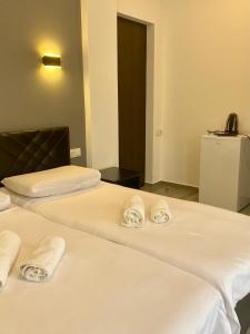Letto o letti in una camera di Hotel Niko