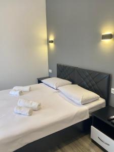 Letto o letti in una camera di Hotel Niko