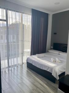 Letto o letti in una camera di Hotel Niko